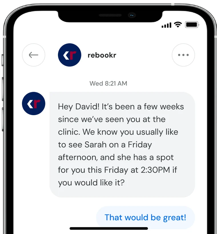 A rebookr text conversation on a phone, offering the patient a Friday 2:30pm appointment.